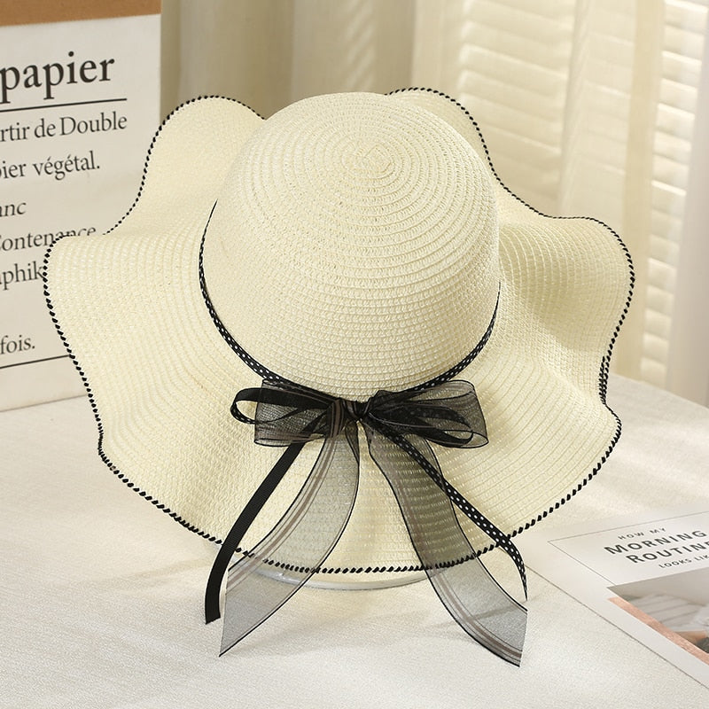 Sombrero de paja ondulado para mujer con lazo | The Parisian